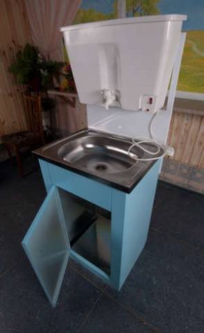 Country washbasin with cabinet and heating