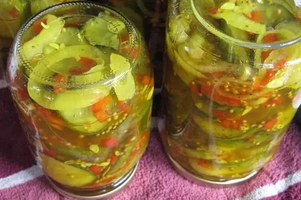 Cucumber salad with turmeric for the winter: canning recipes