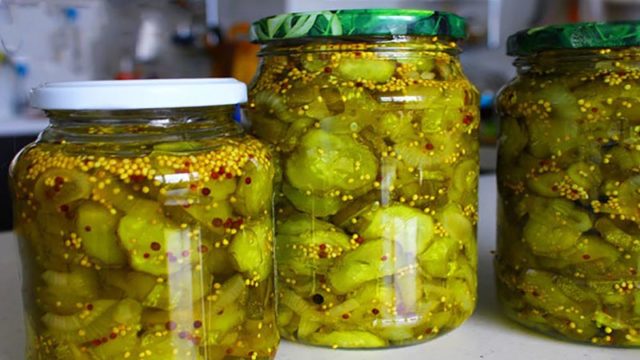 Cucumber salad with turmeric for the winter: canning recipes