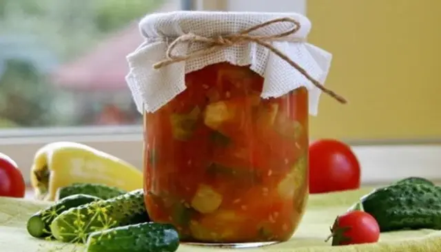 Cucumber salads in tomato juice: awesome recipes for the winter