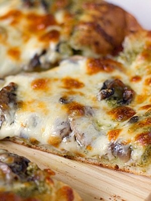 Delicious stuffing for pizza with mushrooms