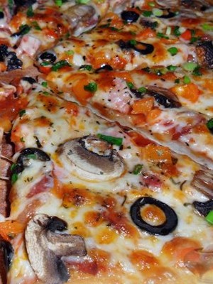 Delicious stuffing for pizza with mushrooms