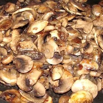 Dishes of champignons with onions