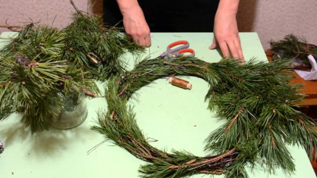 DIY Christmas wreath from branches: spruce, birch, willow