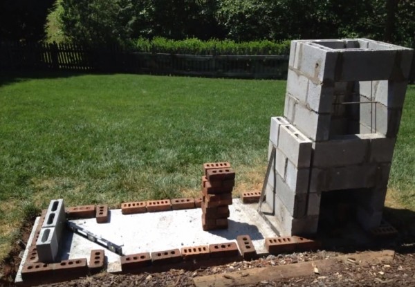 Do-it-yourself brazier with a smokehouse made of bricks