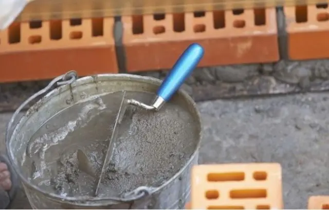 Do-it-yourself brazier with a smokehouse made of bricks