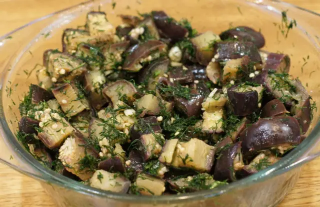 Eggplant for the winter with garlic and dill: recipes for snacks and salads