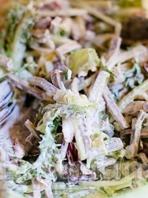 Festive salads with champignons and tongue