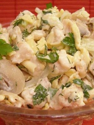 Festive salads with champignons and tongue