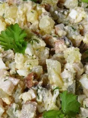 Festive salads with champignons and tongue