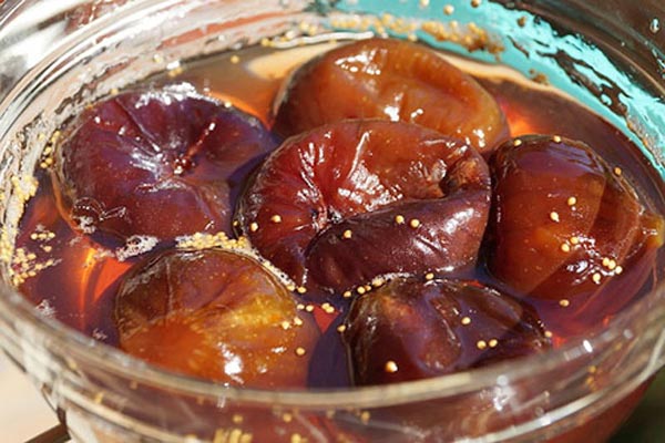 Fig jam: Armenian recipe and fig delicacy boiled with nuts, plums, lemons, oranges