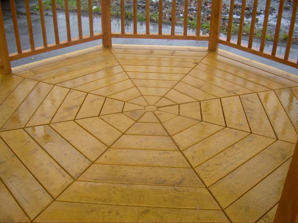 Floor in the gazebo: wooden flooring, stone laying, paving stones, tiles, concrete pad + photo and description of different coatings