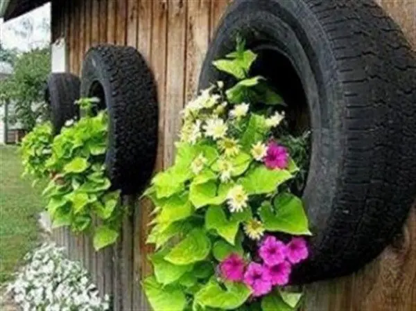 Flowerbeds from tires with their own hands: the original decoration of the garden