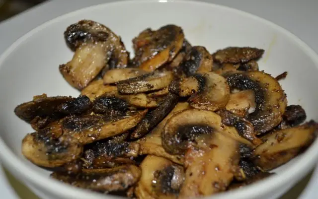 Fried champignons with onions in a pan, in a slow cooker: how delicious to fry with carrots, whole