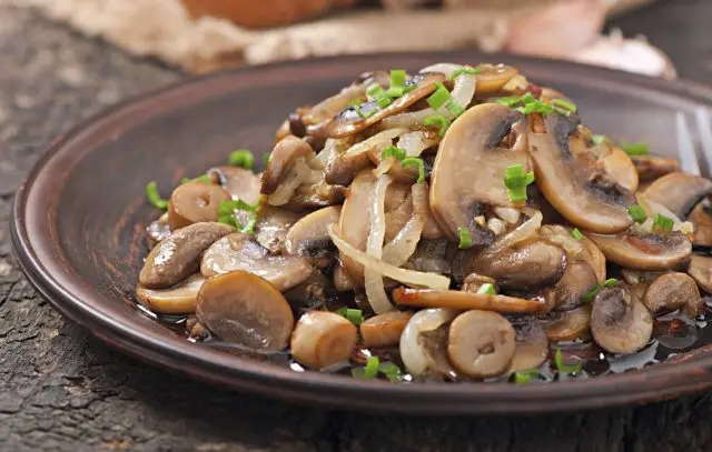 Fried champignons with onions in a pan, in a slow cooker: how delicious to fry with carrots, whole