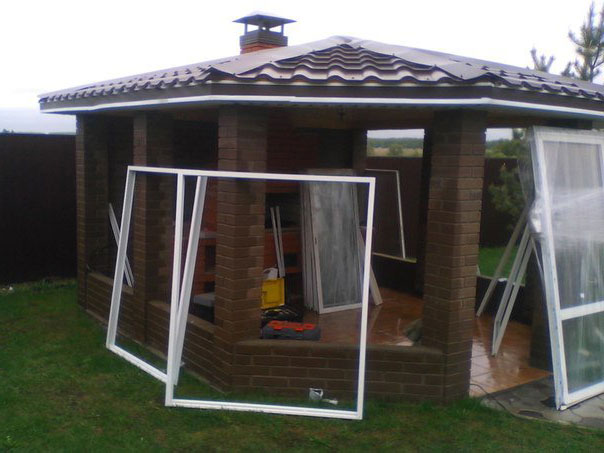 Glazing of gazebos in the country: panoramic, sliding, frameless, stained glass windows, wooden frames, plastic double-glazed windows