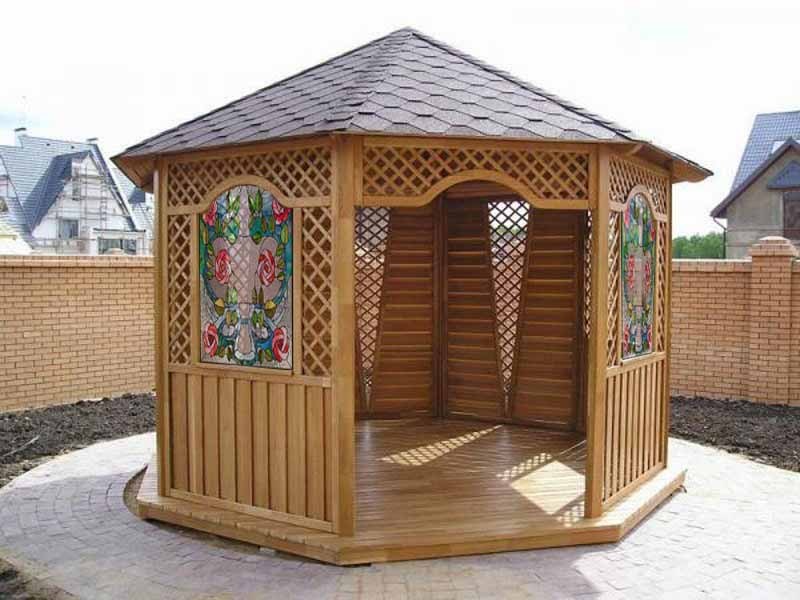 Glazing of gazebos in the country: panoramic, sliding, frameless, stained glass windows, wooden frames, plastic double-glazed windows