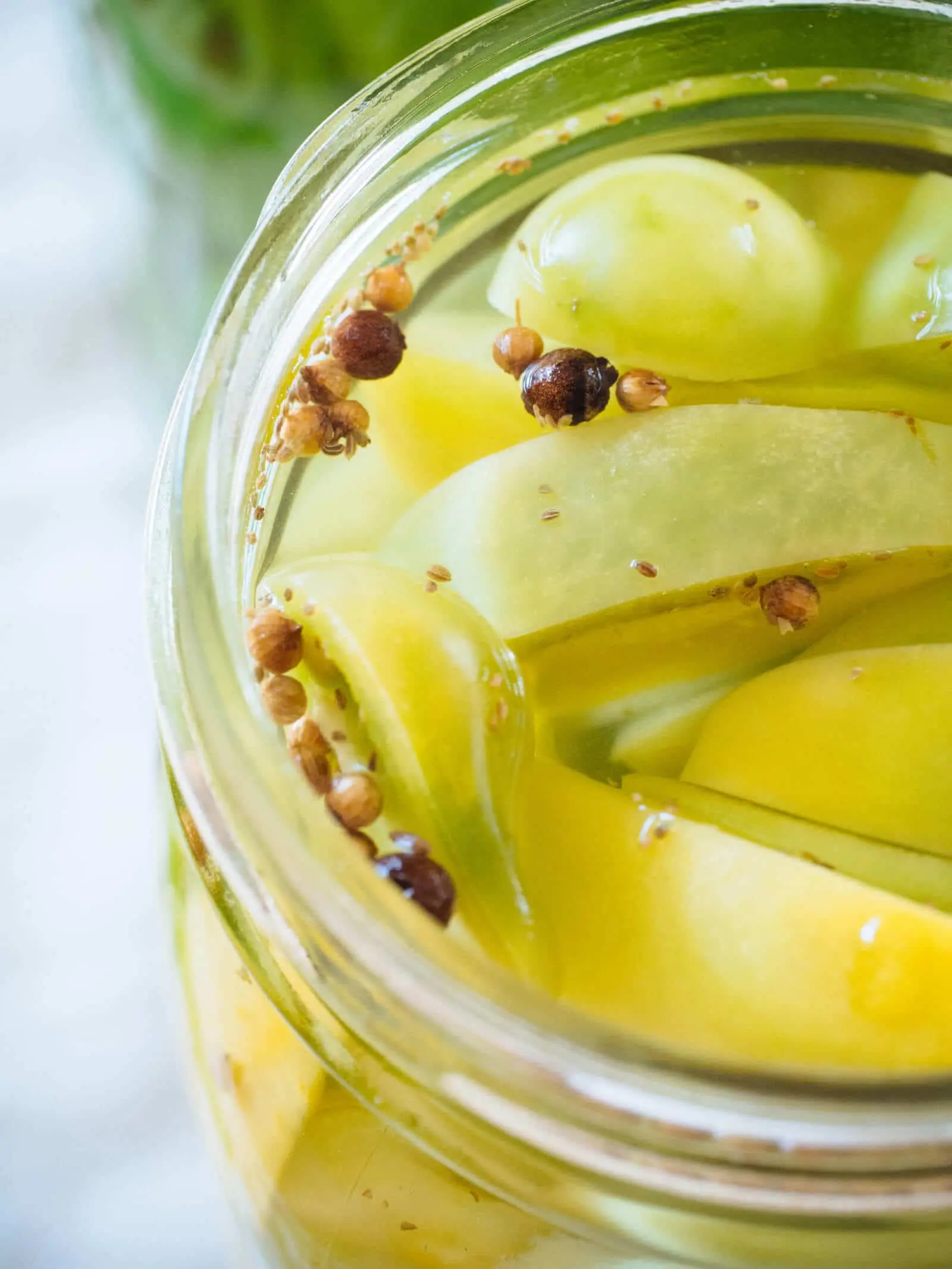 Green tomatoes, like barrels in jars