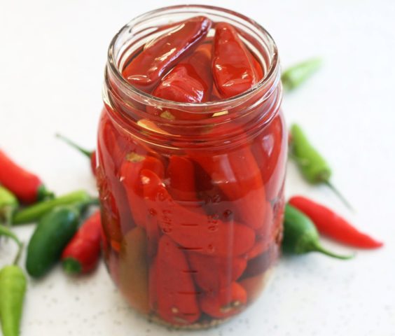 Hot pepper for the winter with honey: recipes for canning and pickling