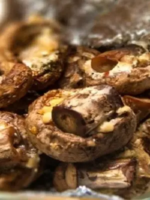 How to bake champignons: recipes for the oven and slow cooker