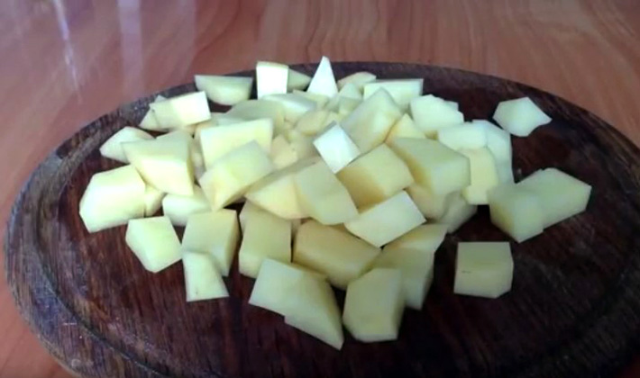 How to cook potatoes with mushrooms in sour cream