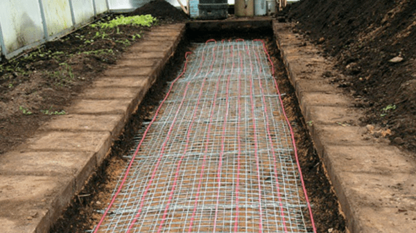 How to heat a polycarbonate greenhouse in spring: infrared heater, underground pipes, cable, air