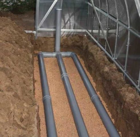 How to heat a polycarbonate greenhouse in spring: infrared heater, underground pipes, cable, air