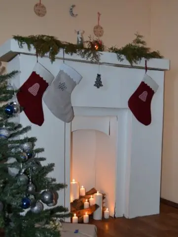 How to make a fireplace out of boxes for the New Year: photo, video