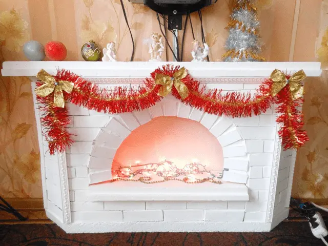 How to make a fireplace out of boxes for the New Year: photo, video