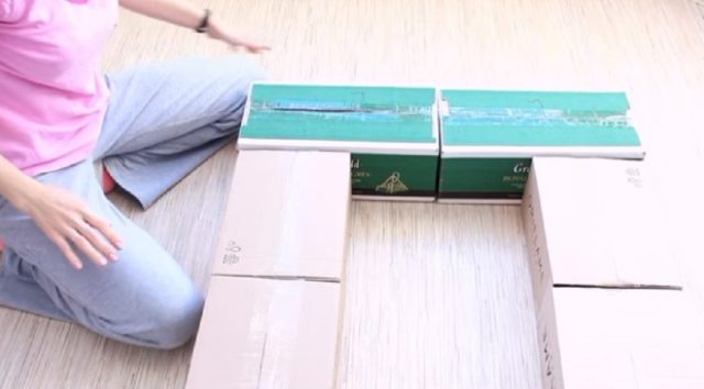 How to make a fireplace out of boxes for the New Year: photo, video