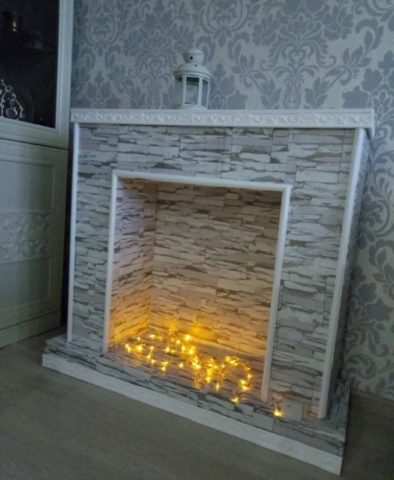 How to make a fireplace out of boxes for the New Year: photo, video