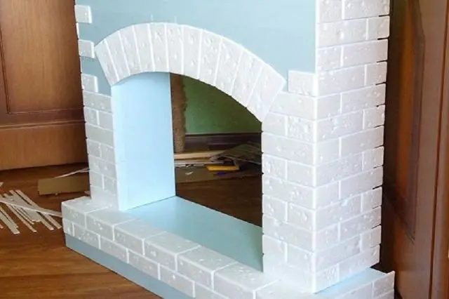 How to make a fireplace out of boxes for the New Year: photo, video