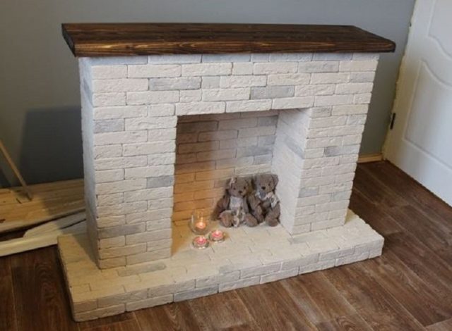 How to make a fireplace out of boxes for the New Year: photo, video