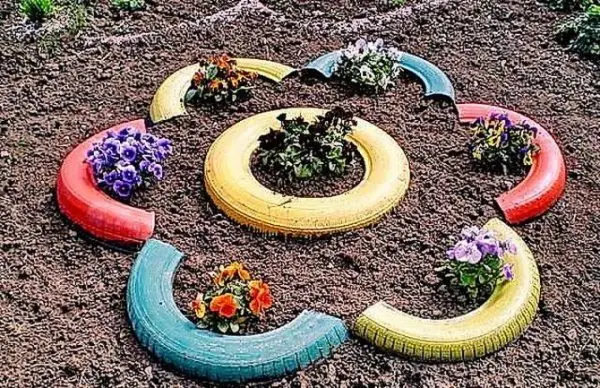 How to paint flower beds from tires yourself