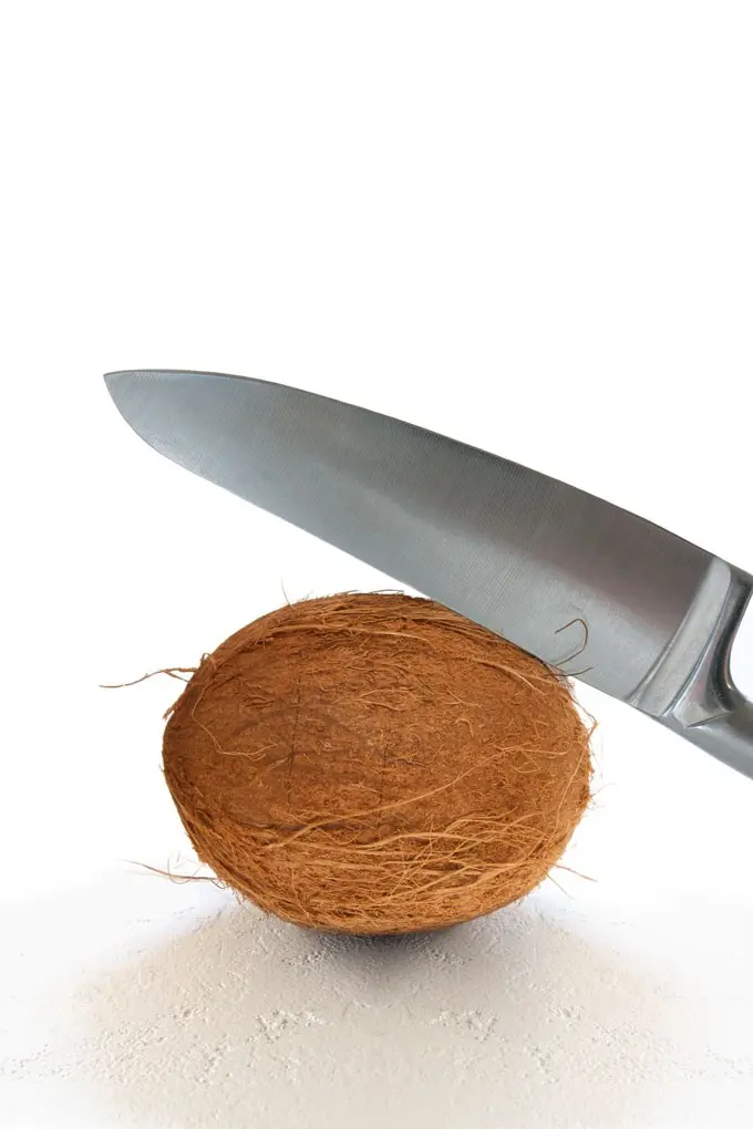 How to Peel a Coconut: The Easy Way, Using a Knife, Hammer, Corkscrew or Hand Saw + Heat and Freeze Methods