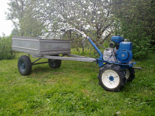 How to plow with a walk-behind tractor: with a plow, with cutters, with an adapter, video