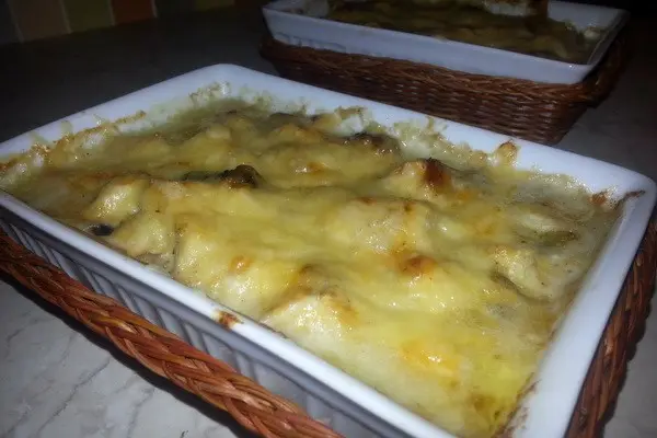 Julienne with mushrooms and cheese in the oven and in a frying pan