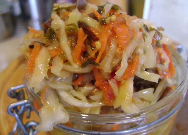 Korean-style eggplant for the winter: without sterilization, with carrots, cabbage, tomatoes