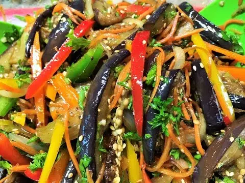 Korean-style eggplant for the winter: without sterilization, with carrots, cabbage, tomatoes