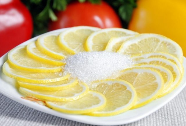 Lemon with sugar: benefits and harms to the body