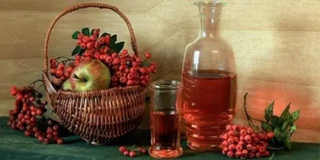 Making homemade rowan wine 