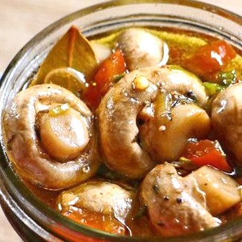 Marinated champignons for the winter: the best recipes