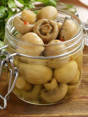 Marinated champignons for the winter: the best recipes