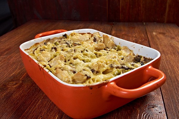 Meat with mushrooms baked in the oven or slow cooker