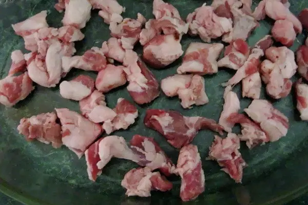 Meat with mushrooms baked in the oven or slow cooker