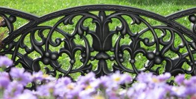 Metal fences for flower beds: examples of metal fences