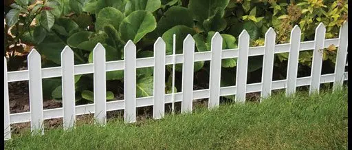 Metal fences for flower beds: examples of metal fences