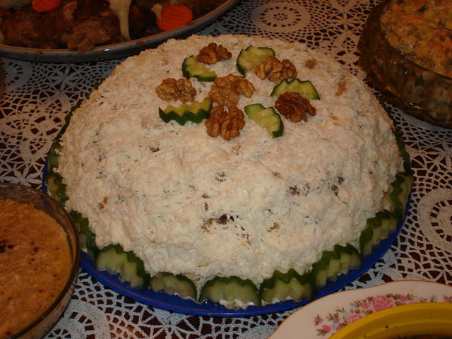 New Years salad Snezhinka with chicken and cheese