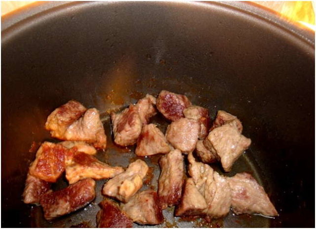 Oyster mushrooms in sour cream in a pan and in the oven: with onions, potatoes, pork