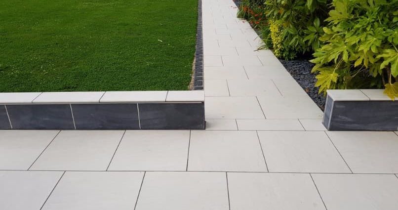 Paths in the country from paving slabs: paving technology + photos of successful design ideas for garden paths